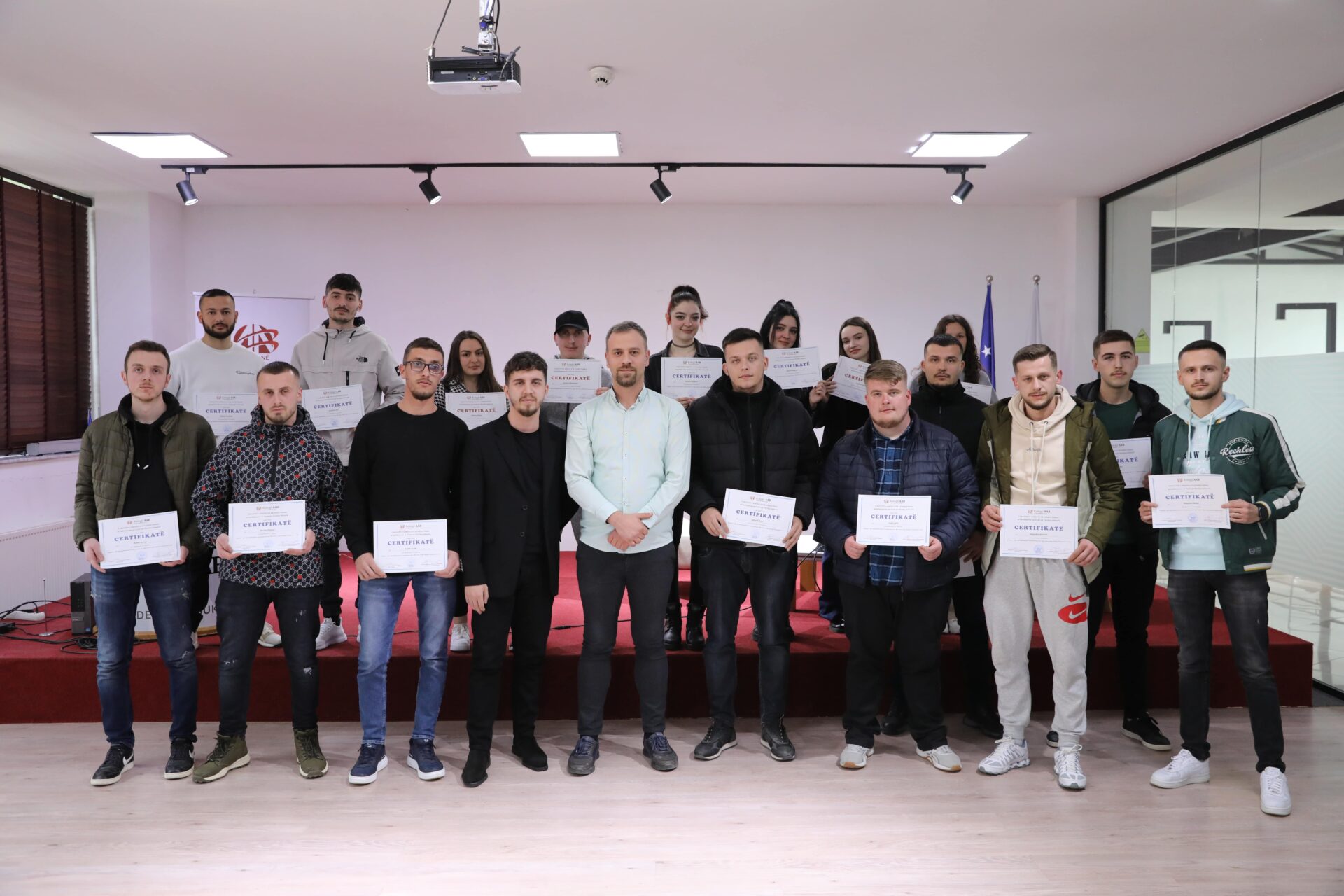 Certificates are distributed to students participating in software development training