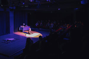 AAB College students enjoy the artistic performance "Give color to life" that talks about women's empowerment